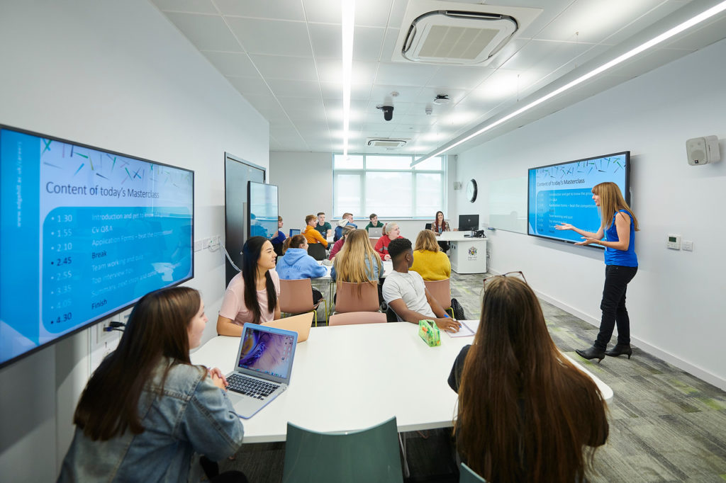 A lecturer teaching a class
