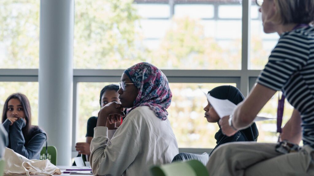 Students listening in a seminar session