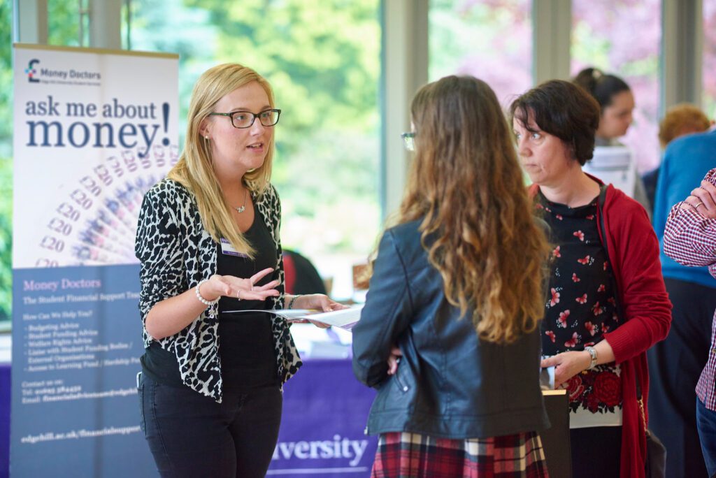 Prospective students discussing finance related queries with the Money Advice Team
